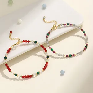 Pulsera artesanal elegante de cuentas de cristal de colores con malaquita y labradorita