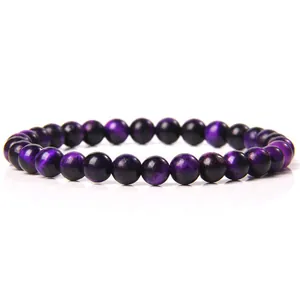 Macro view showing the glossy texture of 6mm purple natural stone beads on a stretch bracelet