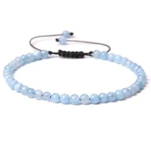 Adjustable 4mm light blue natural stone beaded bracelet with black woven cord closure