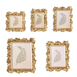 Set aus kunstvollen goldenen Harz-Fotorahmen im Vintage-Gänseblümchen-Stil, Gold