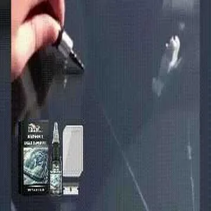 Detailed close-up showing the application of Homonth car glass crack repair resin