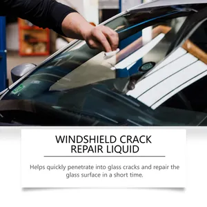 Professional car windshield crack repair liquid application on a damaged glass surface detail.