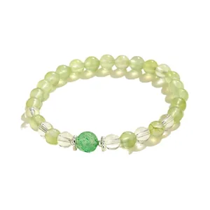 Elegant handmade prehnite and green strawberry quartz beaded bracelet with silver spacers