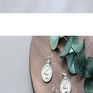 Detailed view of S925 silver vintage Queen Elizabeth II coin pendant charm