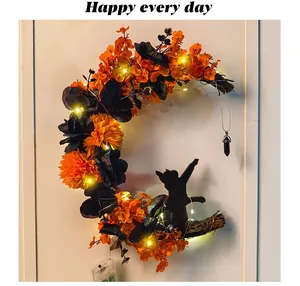 Ghirlanda di gatto luna di Halloween con fiori arancioni e luci LED scintillanti