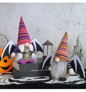 Halloween bat-winged gnomes with colorful knit hats and plush beards on black books