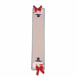 Festive Christmas burlap table runner with cute snowman and red polka dot bow accents