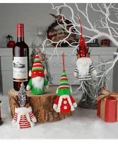 A group of festive glowing Christmas gnomes hanging ornaments featuring reindeer antlers