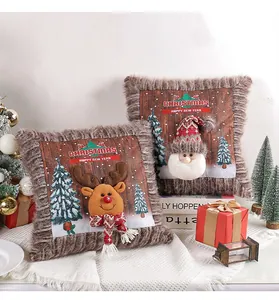 Detailed view of 3D plush Christmas pillowcases with Santa and reindeer motifs