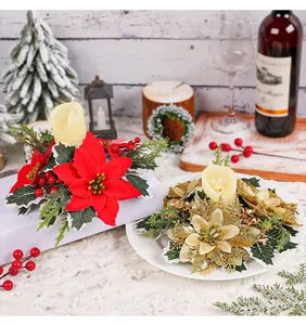 Festive Christmas candle wreath set with red poinsettia and gold glitter flowers.