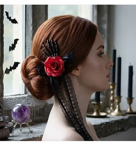 Gothic Halloween skeleton hand hair clip with red rose and black lace ribbon detail