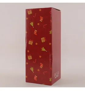 Boîte cadeau rouge sur le thème de Noël avec motifs festifs et marquage de certification CE