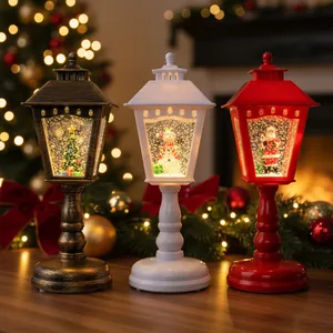 Trois lanternes de Noël à paillettes avec Père Noël, bonhomme de neige et sapin.