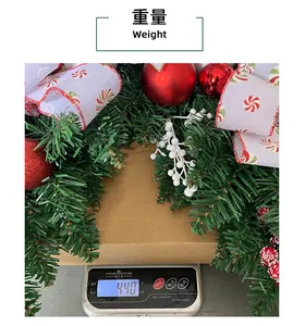 Measurement detail showing the 440g weight of the festive Christmas door garland wreath