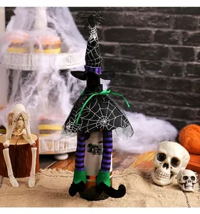 Halloween witch wine bottle cover with spider web cape and striped legs decoration