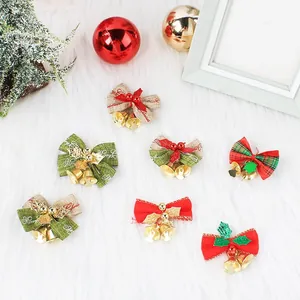 Fiocchi di Natale in iuta con campanellini dorati per decorazioni dell'albero