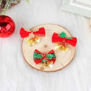 Set di tre fiocchi natalizi con campanellini dorati per decorazioni albero
