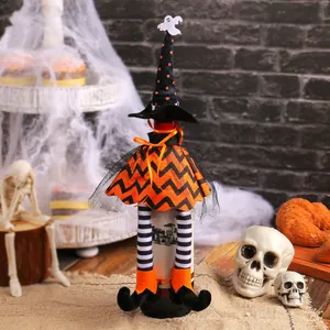 Spooky Halloween witch wine bottle cover set with pointed hat and long striped legs decoration