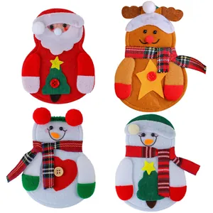Set van 4 kerstbestekhouders van vilt met ontwerpen van de kerstman en een sneeuwpop