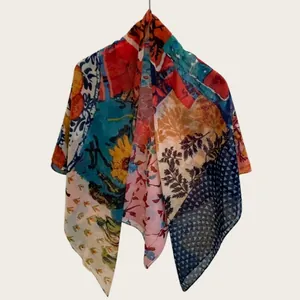 Vibrant colorful floral silk cotton square scarf with bohemian print pattern details.