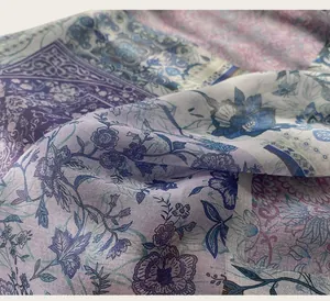Detailed macro view of artistic floral oil painting pattern on soft breathable cotton scarf
