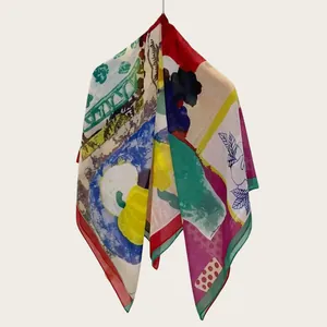 Detail showing artistic pastoral painting patterns on a lightweight silk-cotton square scarf