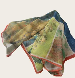 Close-up of lightweight cotton scarf with vibrant artistic oil painting patterns