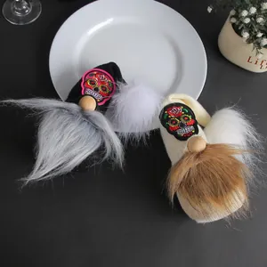 Handmade Halloween faceless gnomes with colorful skull patches and faux fur beards