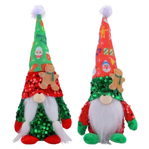 Pair of festive Christmas gnomes with sequin hats and gingerbread man decorations.