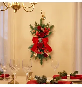 Christmas red velvet reindeer decorative swag hanging on wall in festive dining room