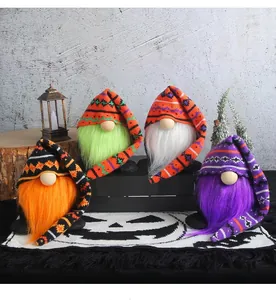 Set of four colorful Halloween gnomes with long knitted hats and plush beards decoration