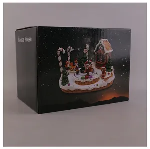 Retail packaging box for Christmas gingerbread man rotating musical ornament with lights