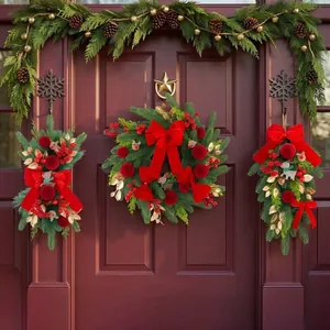 Luxury Christmas wreath and teardrop swag set featuring red velvet bows for front door decor