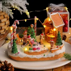 Musical gingerbread house with LED lights and rotating skating rink Christmas ornament