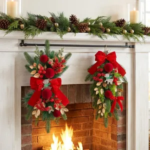 Traditional Christmas teardrop swags with red velvet bows and reindeer on fireplace.
