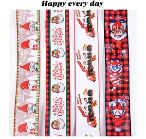 Detail view of four Christmas ribbons featuring gnomes, Santa Claus, and plaid patterns