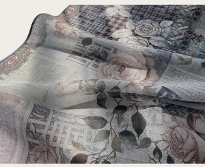 Macro view showing the detailed vintage oil painting floral pattern on a scarf