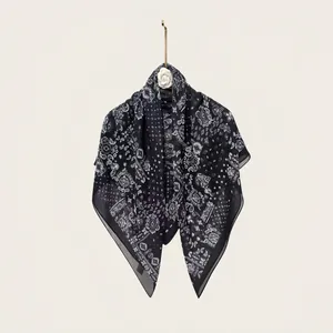 Elegant black silk cotton square scarf with white floral paisley patterns for summer wear