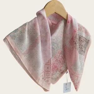 Elegant Chinese style cotton square scarf with pink oil painting pattern on a hanger