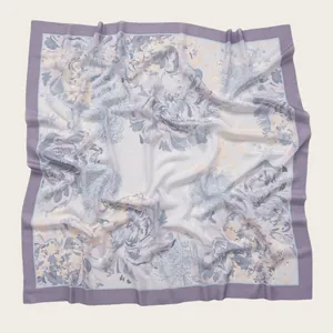 Elegant floral printed voile square scarf featuring scalloped edges in soft lilac tones.