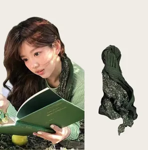 Detailed view of dark green floral pleated scarf featuring high-quality cotton linen fabric