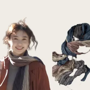 Close-up view showing the soft crinkled texture of this artistic multi-color cotton linen scarf