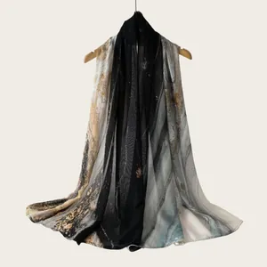 Elegant watercolor gradient striped rayon scarf shown hanging to highlight soft drape.