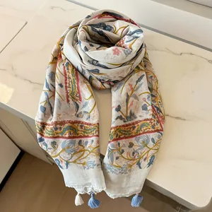 Elegant lightweight floral scarf shawl with decorative tassels for summer style.