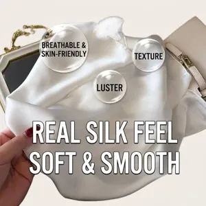 Detail showing the soft texture of a creamy white silk-feel square scarf for women
