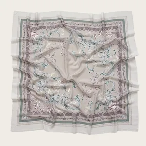 Elegant floral print square scarf with wavy edges and intricate scroll pattern details