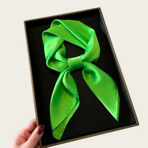 Neon green silk-like satin square scarf tied in a knot for women's neck wear decoration