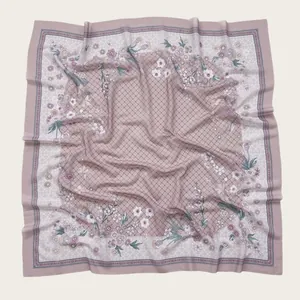 Detail view of square floral print scarf with elegant wavy scalloped edges