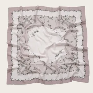 Floral print square scarf with delicate wavy laser-cut edges and soft rose pink border