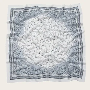Elegant light blue floral print square scarf with delicate vine patterns for women